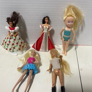5 Assorted Dolls. 3 McDonalds Barbie’s and 2 unknown dolls